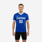 Adult male wearing a custom royal blue practice jersey with white V-neck trim and white sleeve cuffs, team name and number printed on the chest