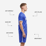 Adult male wearing custom Royal Blue and White soccer uniform 2-piece kit with geometric tone-on-tone jersey texture