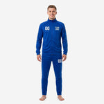 Custom royal blue soccer tracksuit front view showing white dash-stripe sleeve panels, team logo on chest, and player number on jacket and pants