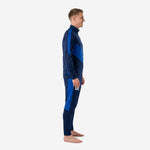 Custom royal blue soccer tracksuit side view showing full zip jacket and tapered navy track pants with royal blue side panel