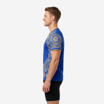 Custom royal blue practice jersey showing Athletic Gold mandala pattern across sleeve and lower body, right side view