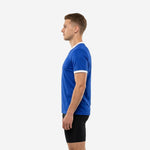 Right side view of a custom blue and white training jersey on an adult male model showing straight hem and clean polyester construction