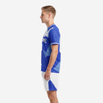 Custom Royal Blue soccer uniform right side view showing full-dye sublimation print and matching white shorts