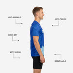 Ice blue mountain gradient hem detail on custom royal blue mens soccer training jersey, lower body close-up