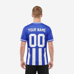 Front-facing custom blue and white soccer jersey displaying arched team name and front player number in white on center stripe