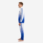 Back detail of custom blue and white soccer tracksuit showing sublimated player name arc and large back number on Royal Blue gradient