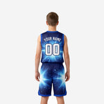 Back view of custom royal blue youth basketball uniforms displaying back number and player name placement on starburst jersey