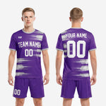 Front and back view of custom royal purple men's soccer team uniforms with team name, front number, player name, and back number print zones