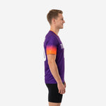 Detail of coral to neon orange gradient sublimation on sleeve panel of custom royal purple mens soccer training top