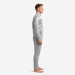 Men's custom silver and urban camo soccer tracksuit side profile showing tapered pants and ribbed cuffs