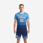 Custom Sky Blue and Navy Blue gradient blue soccer uniform jersey and shorts set, front view on male model
