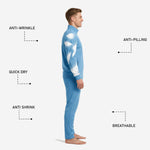 Close-up of white splash sublimation print on sky blue soccer tracksuit sleeve, showing edge-to-edge color coverage