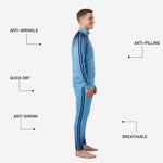 Custom blue soccer tracksuit pants detail showing navy dot-burst ankle fade and contrast outer seam stripe