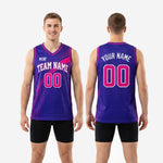 Detail view of purple and magenta custom pink basketball jersey showing V-neck binding, diagonal magenta ray graphic, and halftone dot pattern across chest