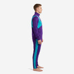 Custom soccer club tracksuit Royal Purple and Teal side view showing Teal side stripe on tapered pants and stand collar jacket