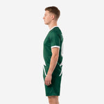 Left side profile of custom Forest Green soccer kit showing full lightning bolt design on jersey and shorts