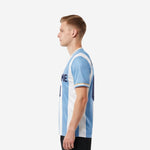 Opposite side view of custom soccer shirts mens displaying full vertical stripe construction and athletic cut