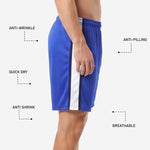 Custom soccer shorts in Royal Blue and White with athletic cut fit and straight hem on adult male model