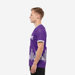 Custom soccer team purple jersey in Royal Purple with silver geometric hem pattern and white player number, right side view
