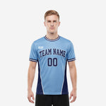 Custom soccer team shirts in powder blue and navy blue with arched team name and front number, men's short sleeve jersey front view
