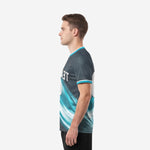 Custom soccer tops teal charcoal right side view showing full-coverage sublimation and crew neck collar trim
