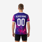 Close detail of custom soccer training jersey chest showing galaxy nebula print in Royal Purple and Hot Pink with team name and number placement