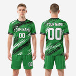 Full custom soccer uniform set in green and black with scratch graphic, jersey and shorts included