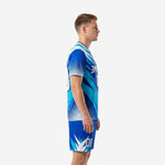 Custom soccer uniform kits for teams in Royal Blue and Sky Blue, left side view showing spike pattern and shorts