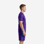 Custom soccer uniform kits for teams showing Royal Purple camo jersey and shorts, left side view