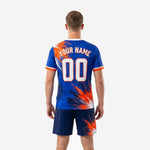 Custom soccer uniform kits Royal Blue Orange detail view of sublimated burst print and crew neckline