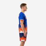 Custom soccer uniform kits for teams Royal Blue and Orange, left side view showing mesh panels and sleeve cuffs