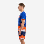 Custom soccer uniform kits for teams Royal Blue and Orange, right side view showing burst graphic on jersey and shorts