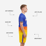 Yellow soccer uniform shorts detail with Royal Blue and orange side stripe from custom soccer kit