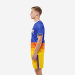Men's custom soccer uniform kit in Royal Blue and Yellow, right-side profile showing side stripe shorts