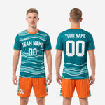 Custom soccer uniform kits teal and orange wave design, back view showing player name and number print zones