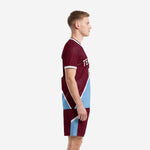 Soccer uniform men maroon and powder blue full kit left side view showing diagonal panel and shorts thigh detail