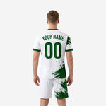 Full-dye sublimated Forest Green and White custom soccer jersey detail showing halftone fade and crew neckline trim
