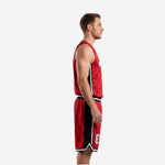 Custom sublimated basketball jersey and shorts in Fire Red with black side panels and white trim