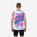Right side view of custom sublimated basketball jersey in watercolor purple and pink splash pattern showing armhole binding detail