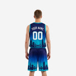 Right side view of teal basketball uniforms showing gradient transition from navy shoulders to teal hem on jersey and matching basketball shorts
