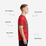 Sublimated red soccer shirt detail showing Kelly Green star design, crew neck trim, and moisture-wicking polyester fabric