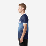 Custom soccer jersey in Navy Blue and Sky Blue gradient dot-burst print, right side view showing full sublimation coverage from shoulder to hem