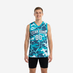 Custom teal basketball jerseys with navy camo and lightning overlay print, showing front and back views with team name and number 00