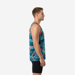 Teal and orange sublimated basketball jersey showing camo base with glowing crack overlay and coral V-neck binding on male model