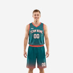 Custom teal basketball uniforms with coral binding, sunburst jersey pattern, and halftone diamond shorts fade shown front and back on adult male model