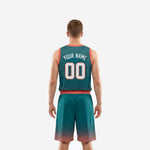 Opposite side view of custom teal basketball uniform set showing sunburst ray pattern on jersey body and coral shorts waistband