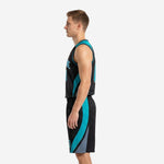 Opposite side view of black and teal basketball uniform set showing matching jersey and shorts side panel alignment on male model