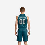 Opposite side view of custom teal basketball uniform set displaying the full white and black panel detail on jersey ribs and shorts outer leg