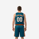 Opposite side view of custom teal men's basketball jersey and shorts set highlighting the orange panel and orange elastic waistband detail