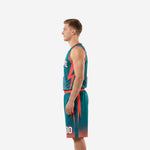 Teal basketball uniform set side profile view showing coral armhole binding sleeveless jersey and coral waistband matching shorts with player number 00